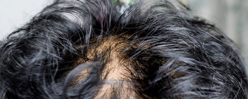 Does Your Hair Feel Waxy? Here are Some Reasons Why